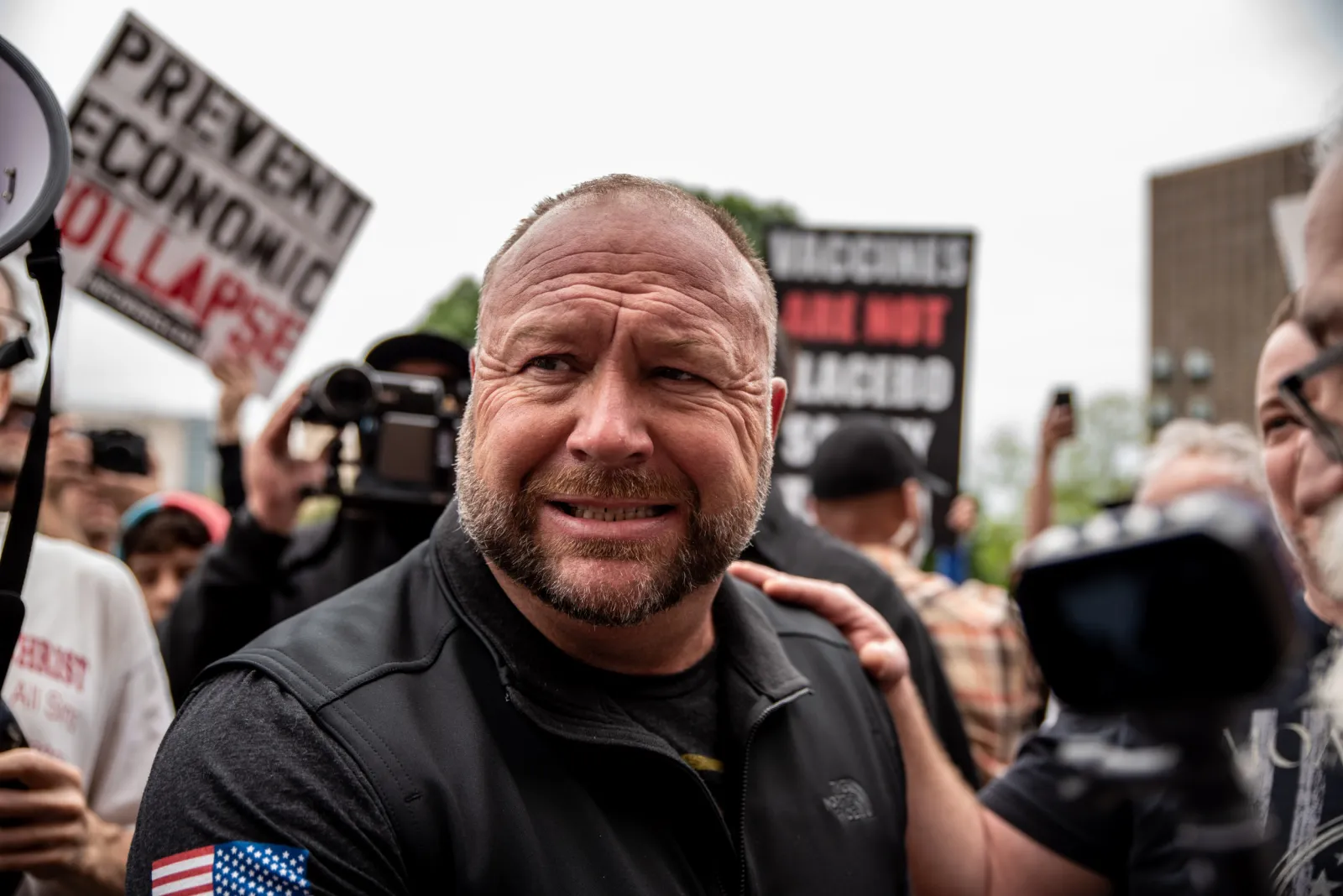Alex Jones attends Texas protest