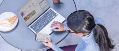 A person using a laptop.
