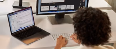 A person typing on a keyboard.