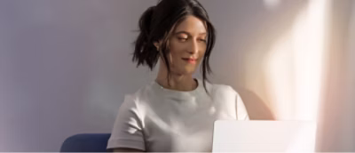 A woman using laptop.