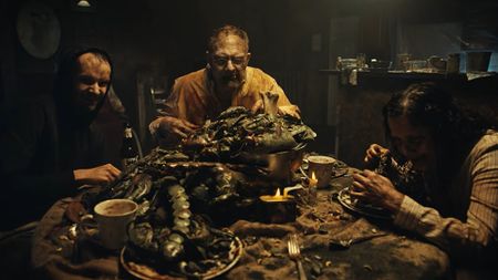 The Baker family chows down on rotten food and sneers at the camera