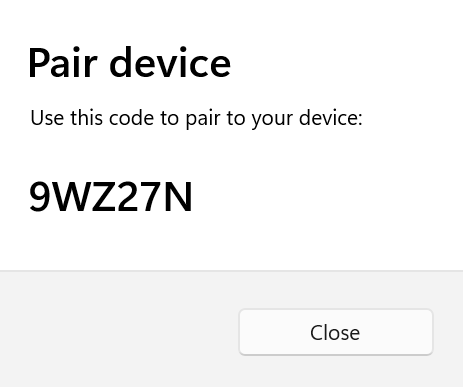 A screenshot of the Pair device dialog that displays the SSH Pin for device pairing.