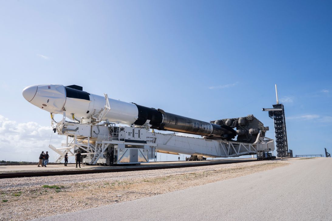A SpaceX Falcon 9 rocket and Dragon spacecraft set to carry the Fram2 mission are rolled out to the launchpad in Florida.