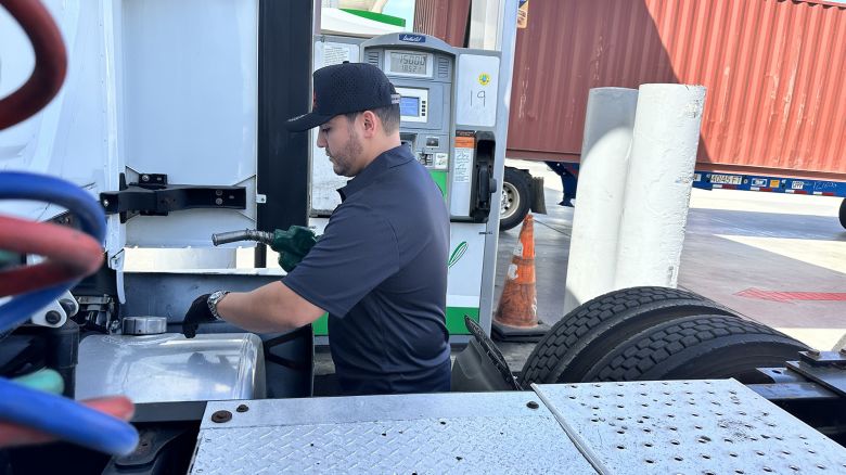 Angel Diaz, co-owner of JD & LA Trucking, fills his trailer with diesel on September 21 in Wilmington, California.