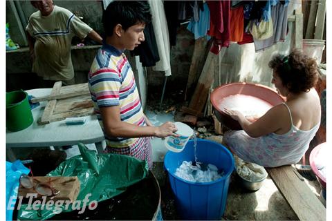 People dealing with water outages in Guayaquil, Ecuador.