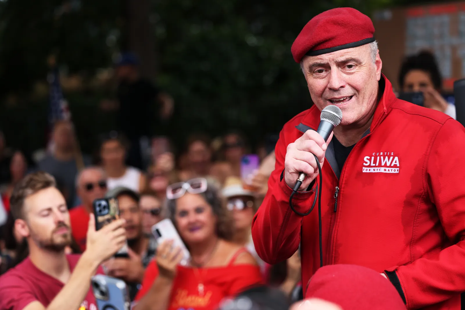 Guardian Angels founder Curtis Sliwa speaks during an antimigrant rally in 2023.