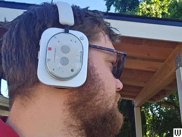 Image may contain: Adult, Person, Accessories, Glasses, Head, Face, Electronics, and Beard