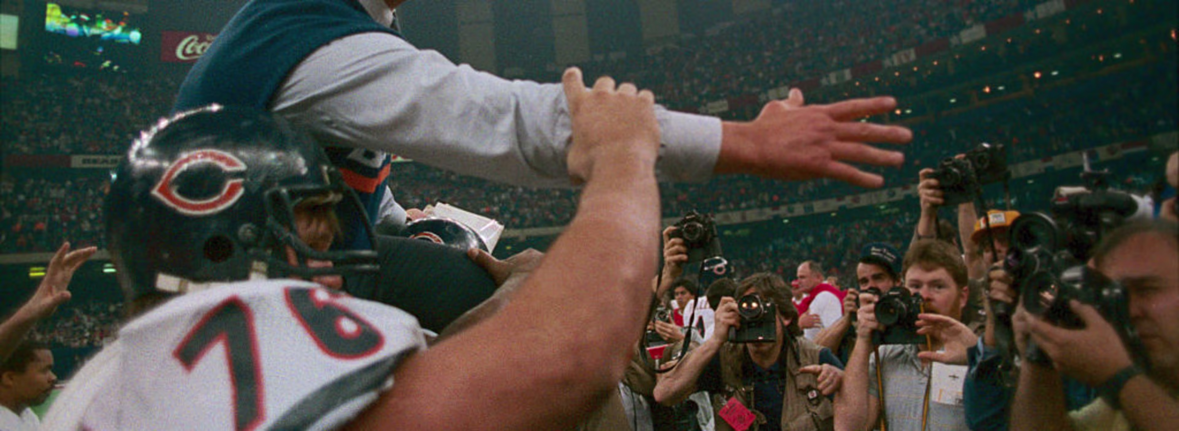 Chicago Bears coach Mike Ditka is given a ride off the field on the shoulder of Steve McMichael (76) after the Bears’ 46-10 Super Bowl XX victory on Jan. 26, 1986, in New Orleans. | Credit: Bettmann/Getty Images