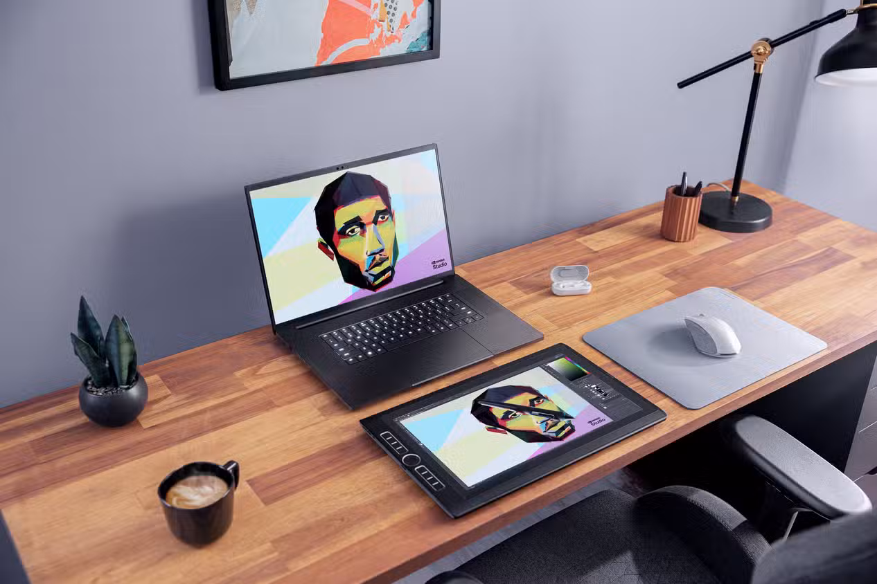 Angled view of the Razer Blade 18 2024 on a wooden desk