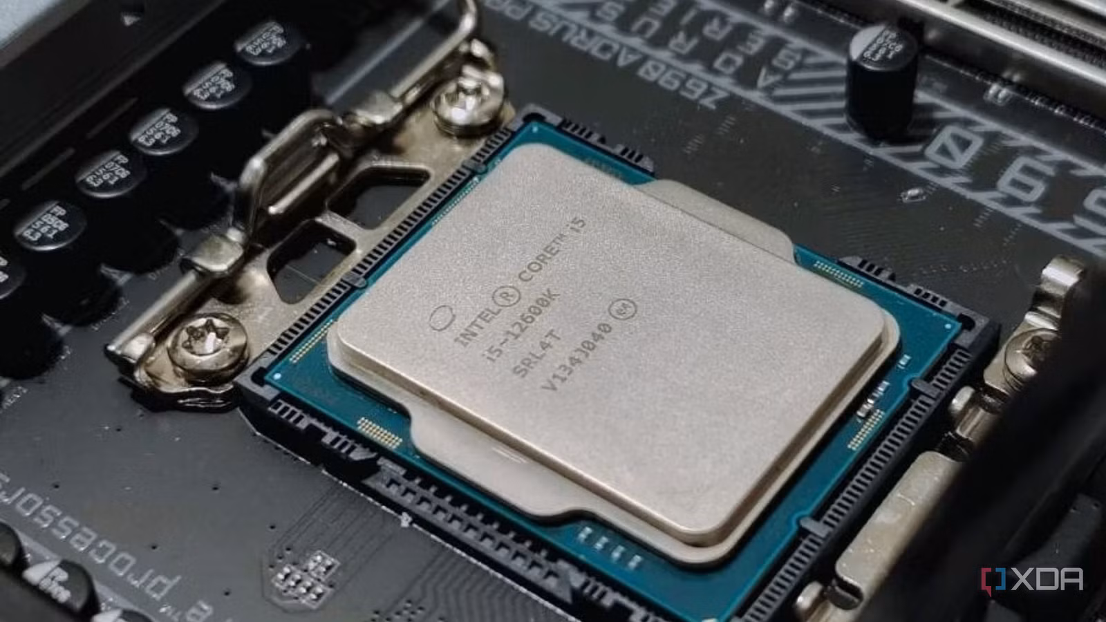 An image showing an Intel processor resting on a motherboard socket.