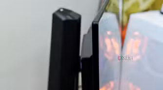 An image showing the side profile of the Asus PG27AQDM monitor.
