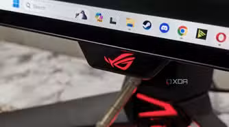 An image showing the Asus logo on the ROG PG27AQDM monitor.