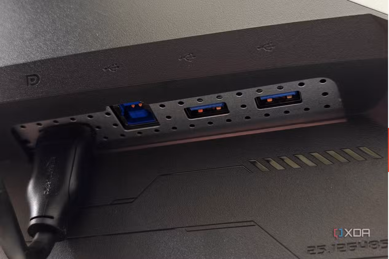 An image showing the right side ports of the Asus ROG PG27AQDM monitor.