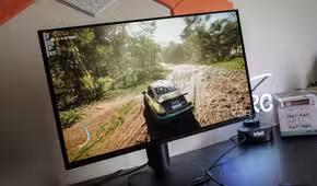 alienware aw2725q on a desk