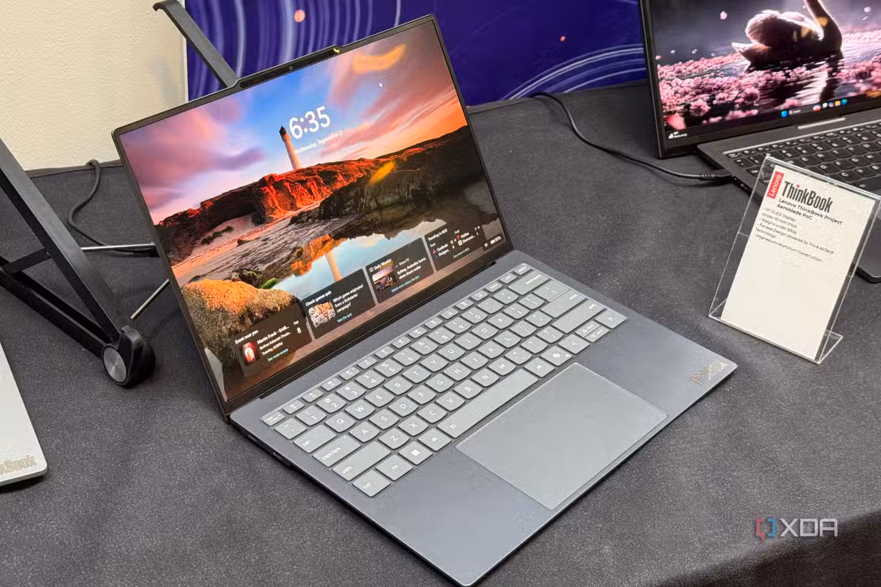 ThinkBook AeroBlade Concept showing the Windows lock screen next to its spec card