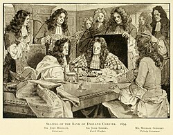 10 men wearing long wigs gather around a desk, looking at some paperwork.