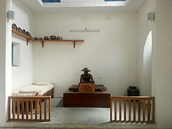 Statue of Narmad at display in museum at Surat