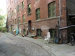 street scene with brick multi-story building