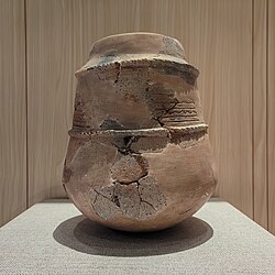 Reconstructed Neolithic pottery discovered at Baojingwan, now featured at the Zhuhai Museum