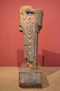An Egyptian statue of Darius I, as Pharaoh of the Twenty-seventh Dynasty of Egypt; 522–486 BCE; greywacke; height: 2.46 m; National Museum of Iran (Teheran)