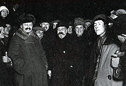 Leon Trotsky, Lev Kamenev and Grigory Zinoviev with a group of other people