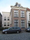 Pand onder schilddak met kroonlijst