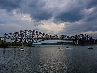 A cantilever truss bridge, Quebec Bridge over the Saint Lawrence River in Quebec, Canada