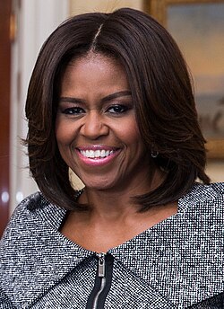 First Lady Michelle Obama and Dr. Jill Biden greet Scott Kelly, First Lady's State of the Union box guest, in the Blue Room of the White House, Jan. 20, 2015 (cropped).jpg