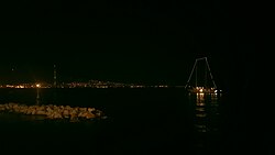 View across a Dock in the Gulf of Naples at night