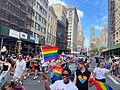 Intersex-inclusive Progress Pride flags at a Pride March in New York. 2023