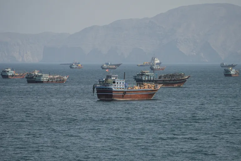 FILE PHOTO: Vessels at the Strait of Hormuz, as seen from Musandam, Oman, October 2, 2026. REUTERS/Stringer/File Photo
