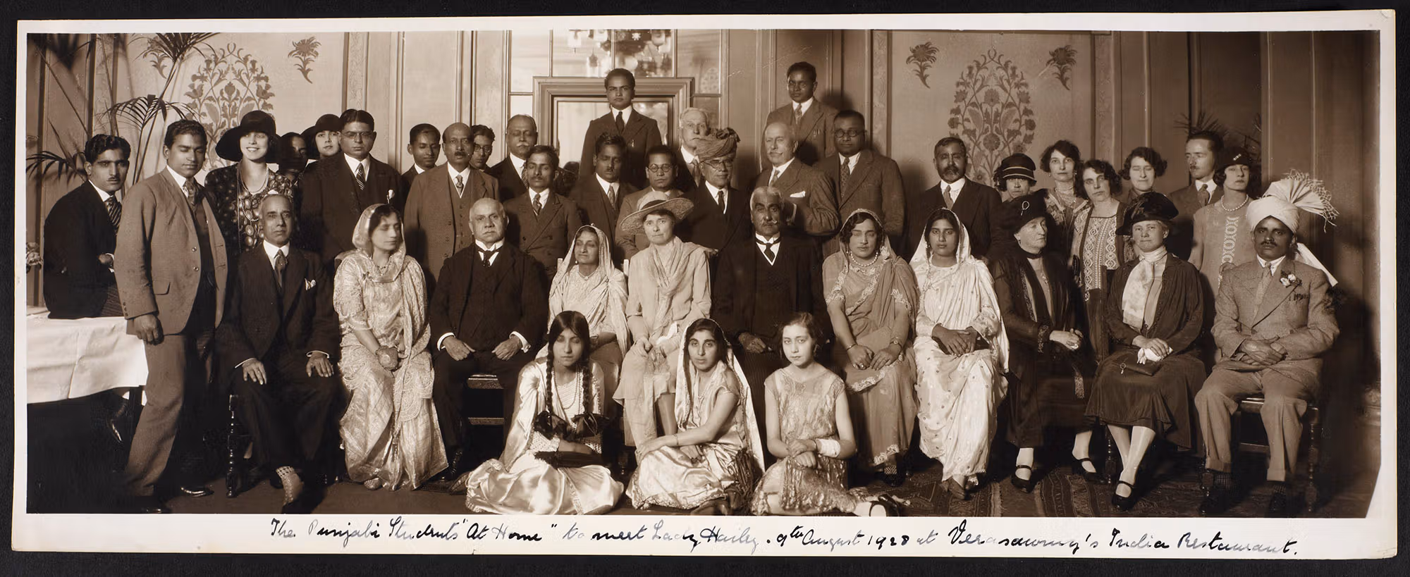 A portrait of a group of people in black and white