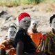 Makua women, with traditional white face mask - Pangane, Mozambique Makua women, with traditional white face mask